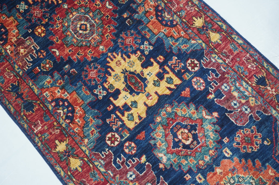 Hand Knotted Afghani Fine Aryana Rectangle Runner in Red