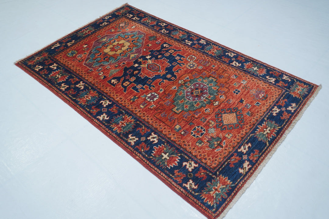 Hand Knotted Afghani Fine Aryana Area Rug in red 