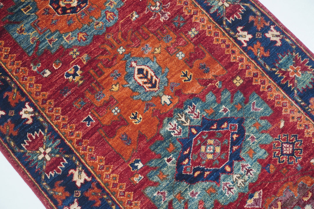 Hand Knotted Afghani Fine Aryana Rectangle Runner in red 