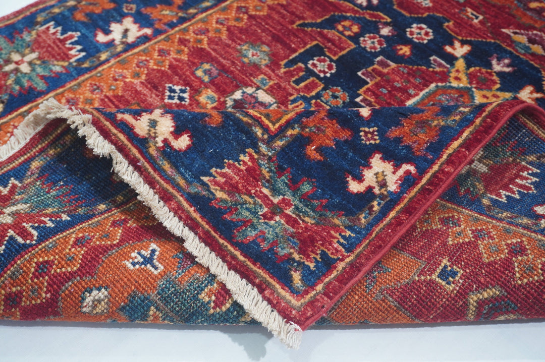 Hand Knotted Afghani Fine Aryana Rectangle Runner in red 