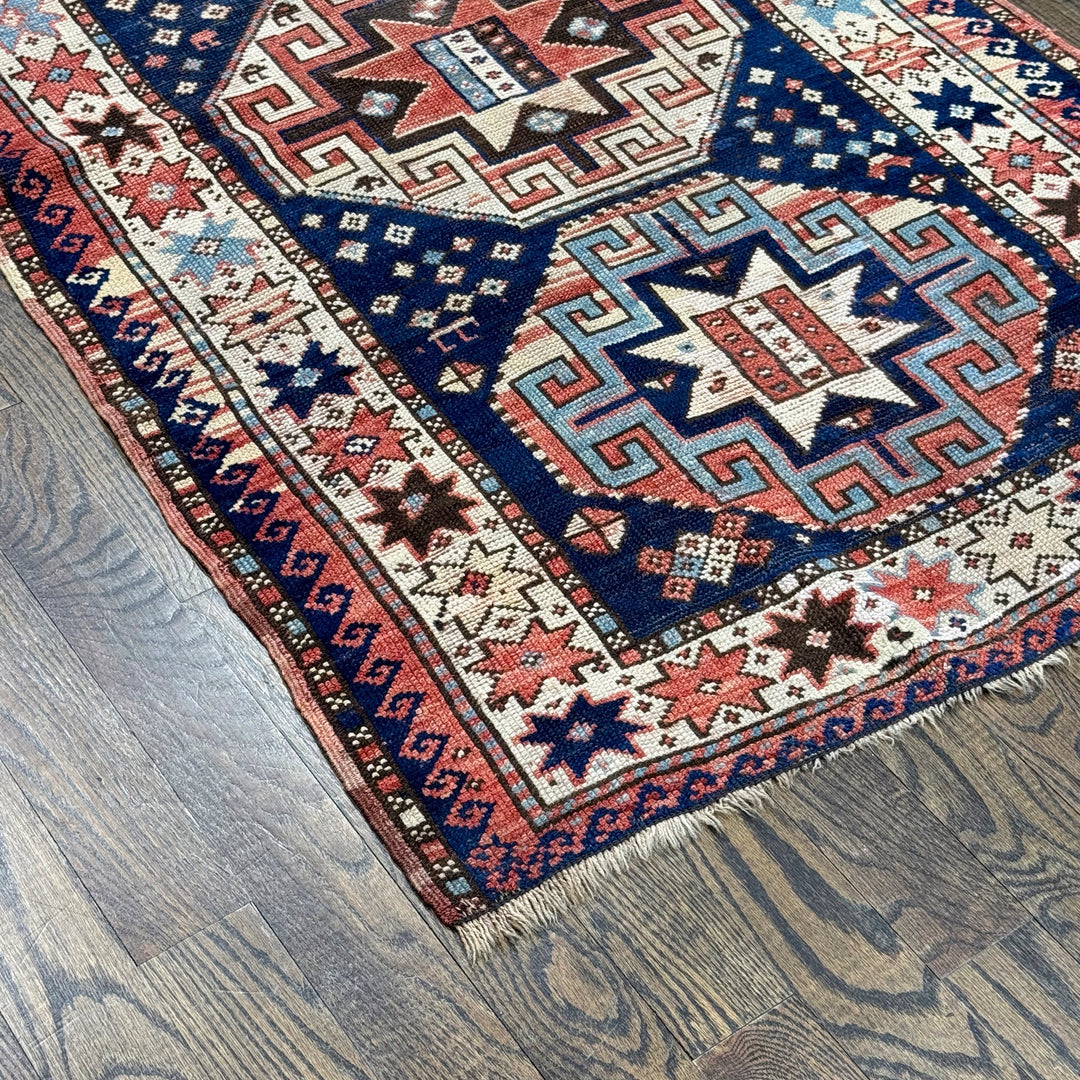 Antique Blue and Red Caucasian Kazak Rug