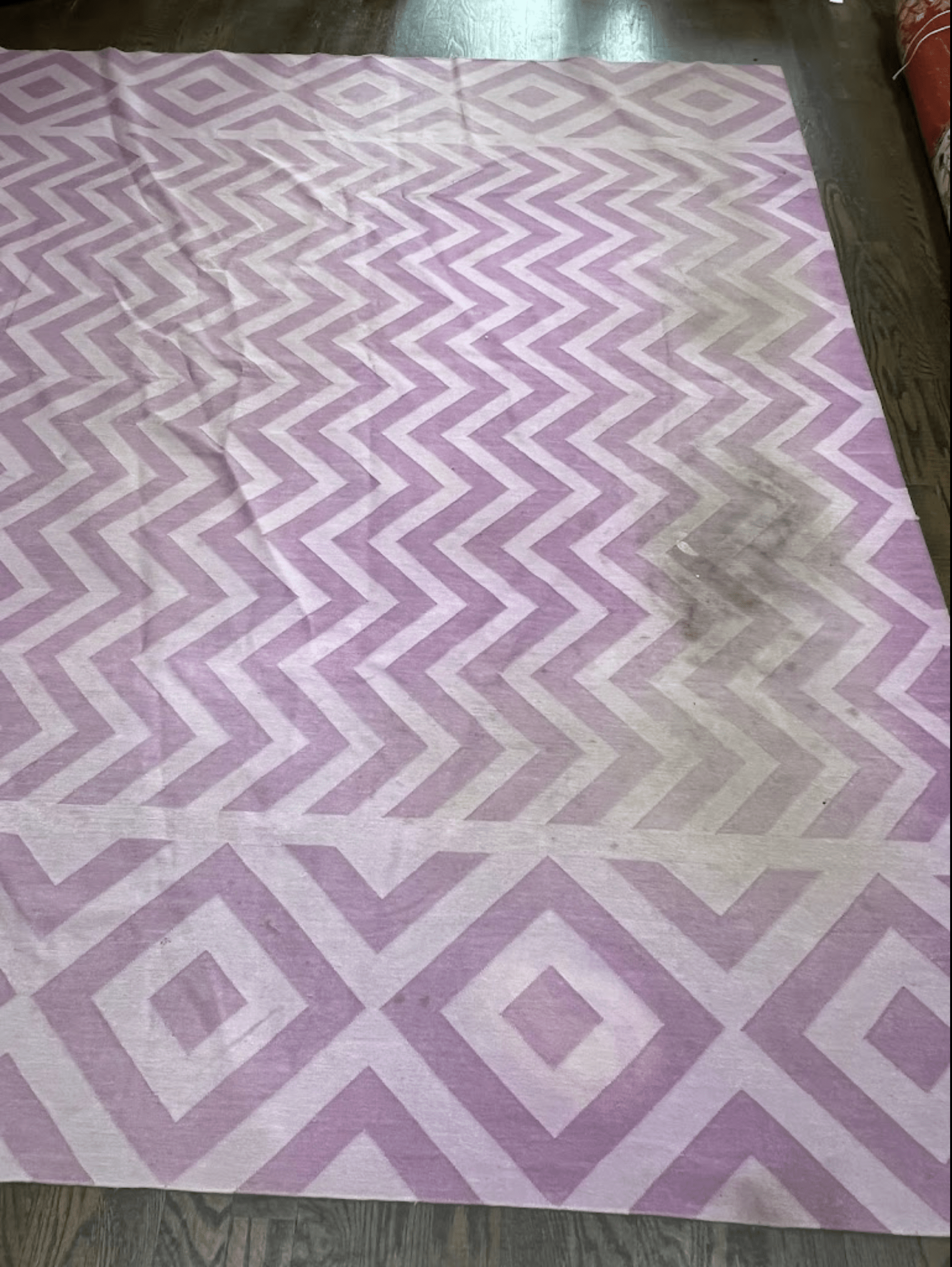 A customer pink rug before cleaning 