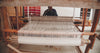 Video of an artisan using a machine to assist himself in making a rug. Stock video from pexels. 